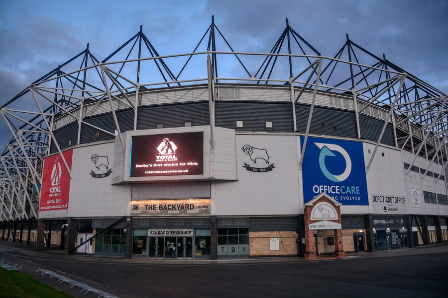 The front of Pride Park Stadium under evening sky